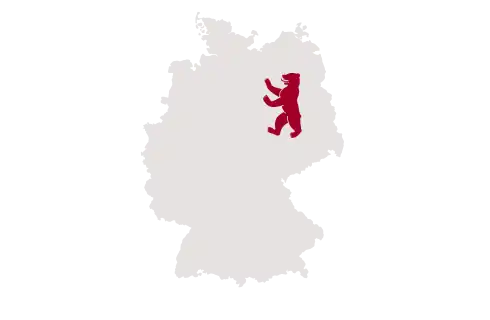 Icon einer Deutschlandkarte mit einem Berliner Bären, das den lokalen Fertigungsstandort der Schaeffer AG in Berlin repräsentiert.